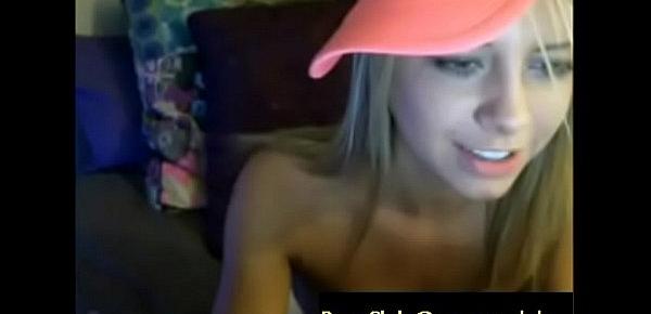  playful and tattoed blonde slut with a pink cap and perfect tits records herself on a webcam, finger